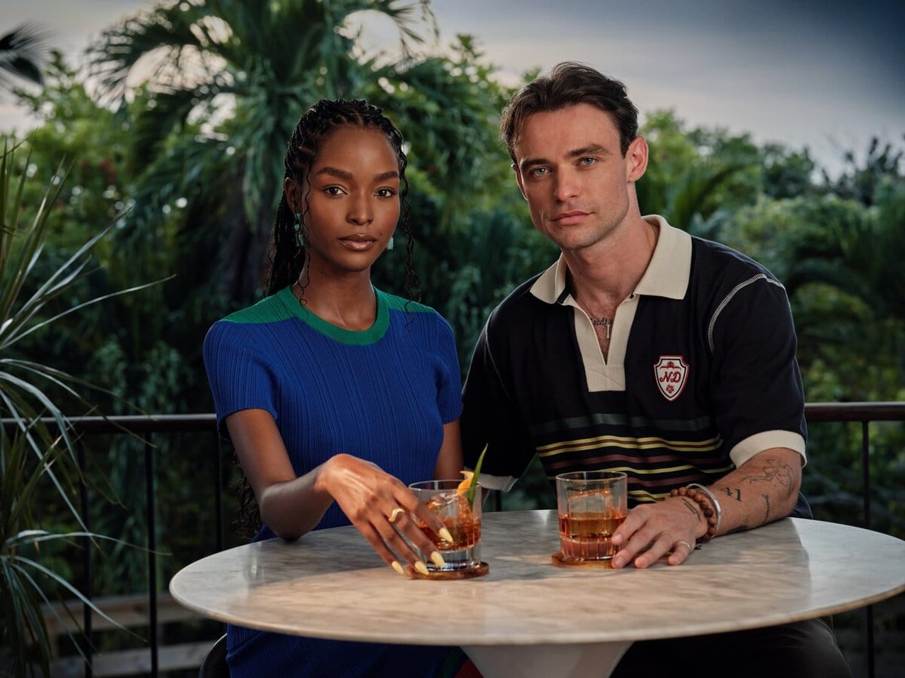 Former Miss Universe Jamaica Miqueal-Symone Williams and Scottish actor and The Glenlivet brand ambassador Thomas Doherty enjoy The Glenlivet Jamaica Edition Banana Old Fashioned.
